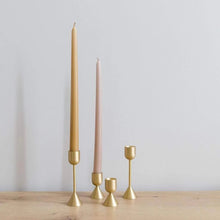 Load image into Gallery viewer, golden light tapered candle holder
